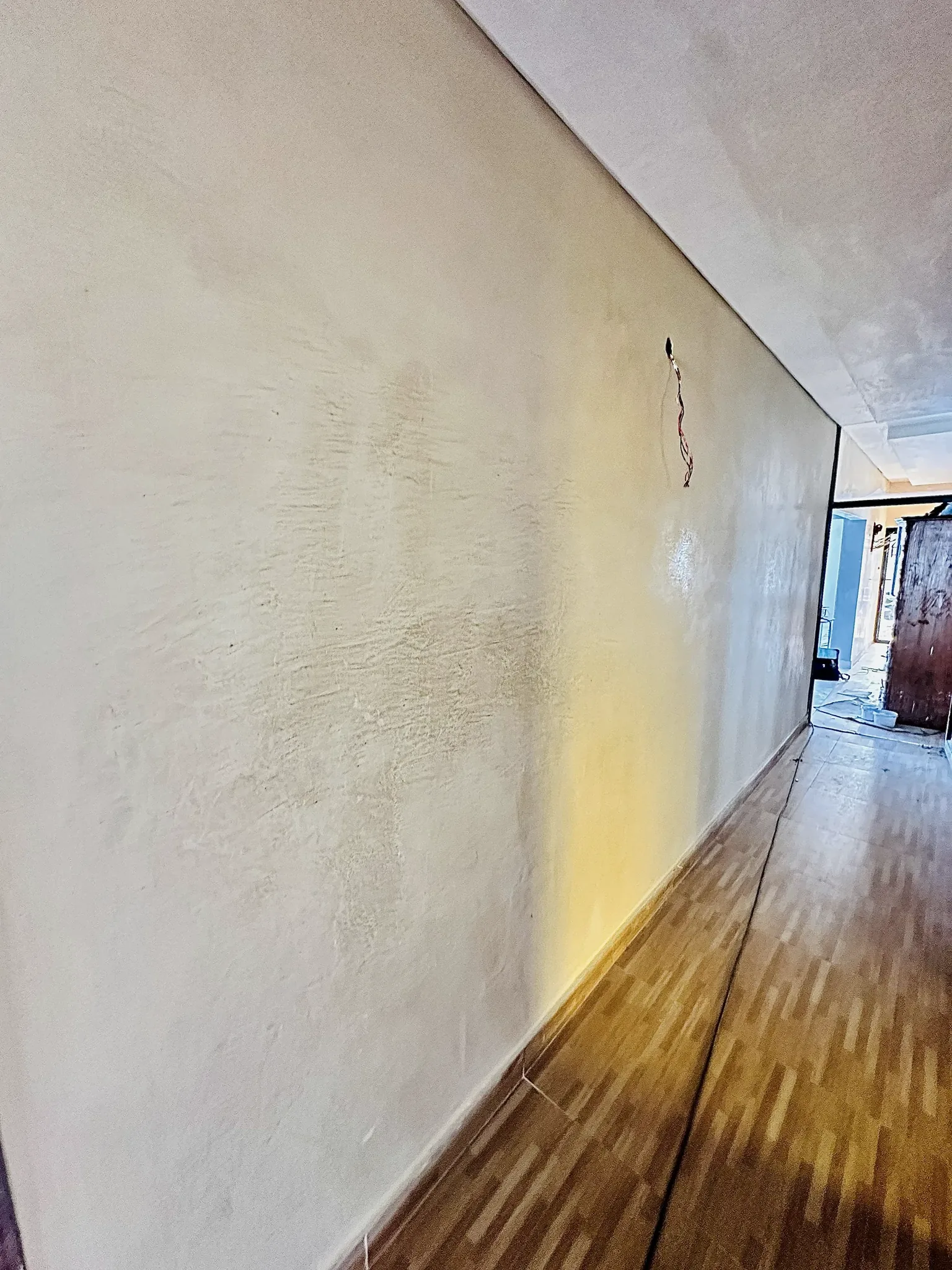 Cream venetian plaster hallway